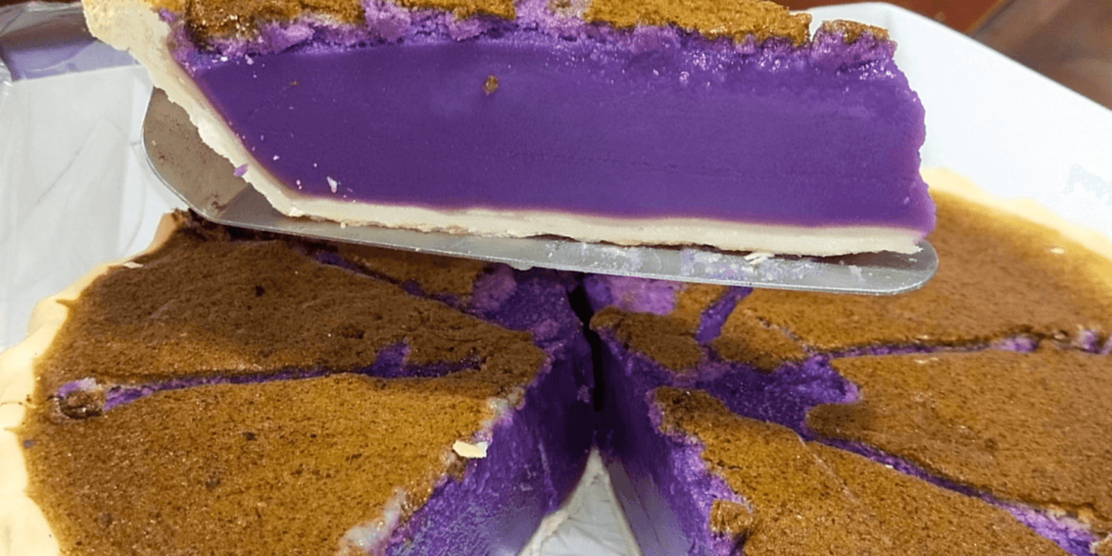 A slice of very vivid purple ube pie.