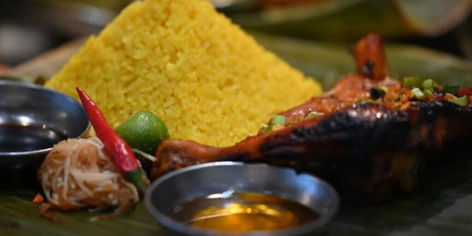 Food from Kabalen Restaurant in Toronto, Ont. shows yellow-hued java rice and grilled chicken. Photo by Yona M. Harvey